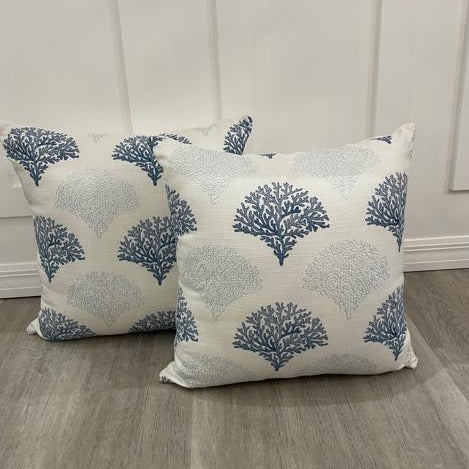 Coral and 2025 gray pillows